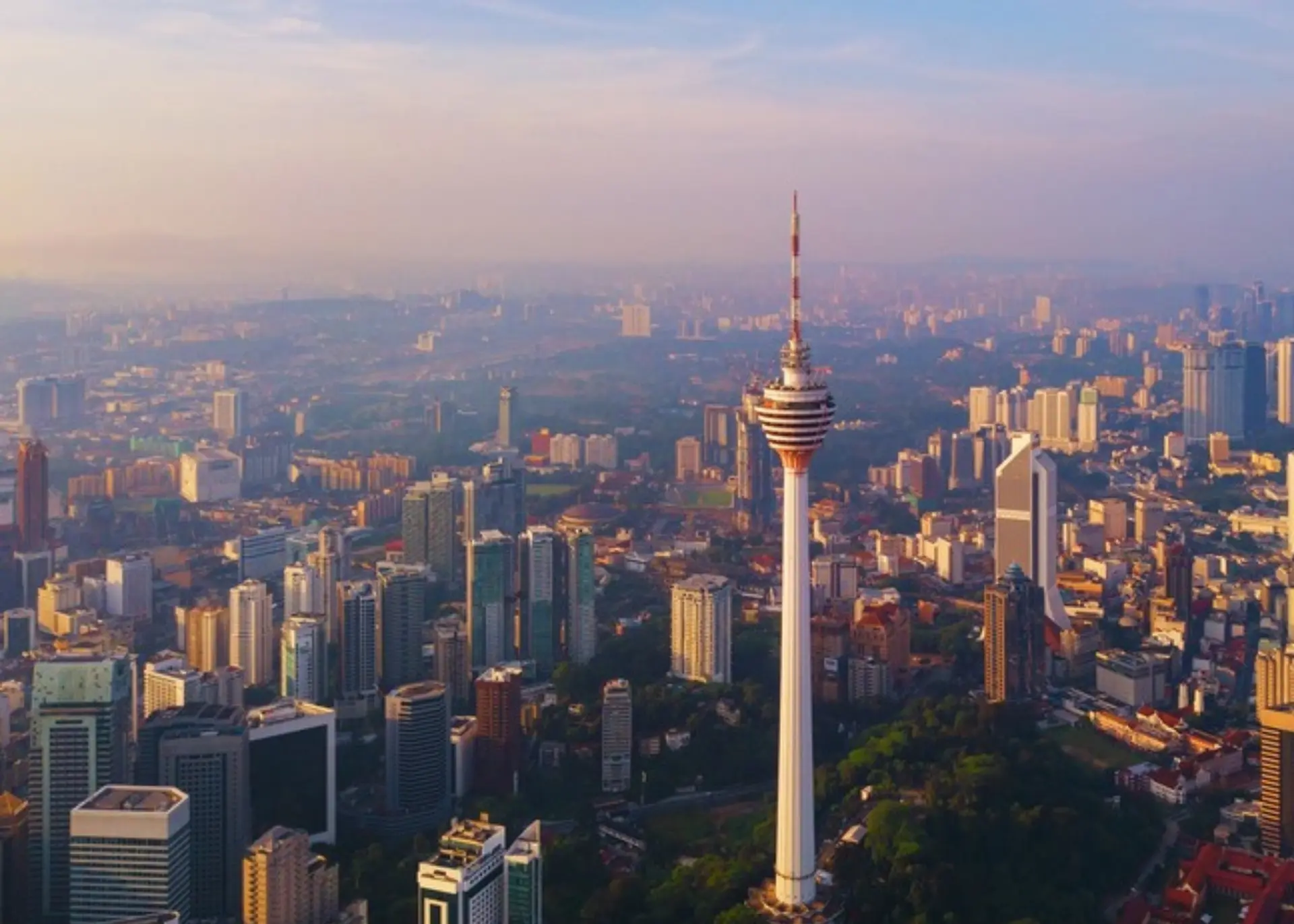 The KL Tower (Menara Kuala Lumpur) rising above the city in the morning light, for Sylvie di Giusto, international keynote speaker in Kuala Lumpur