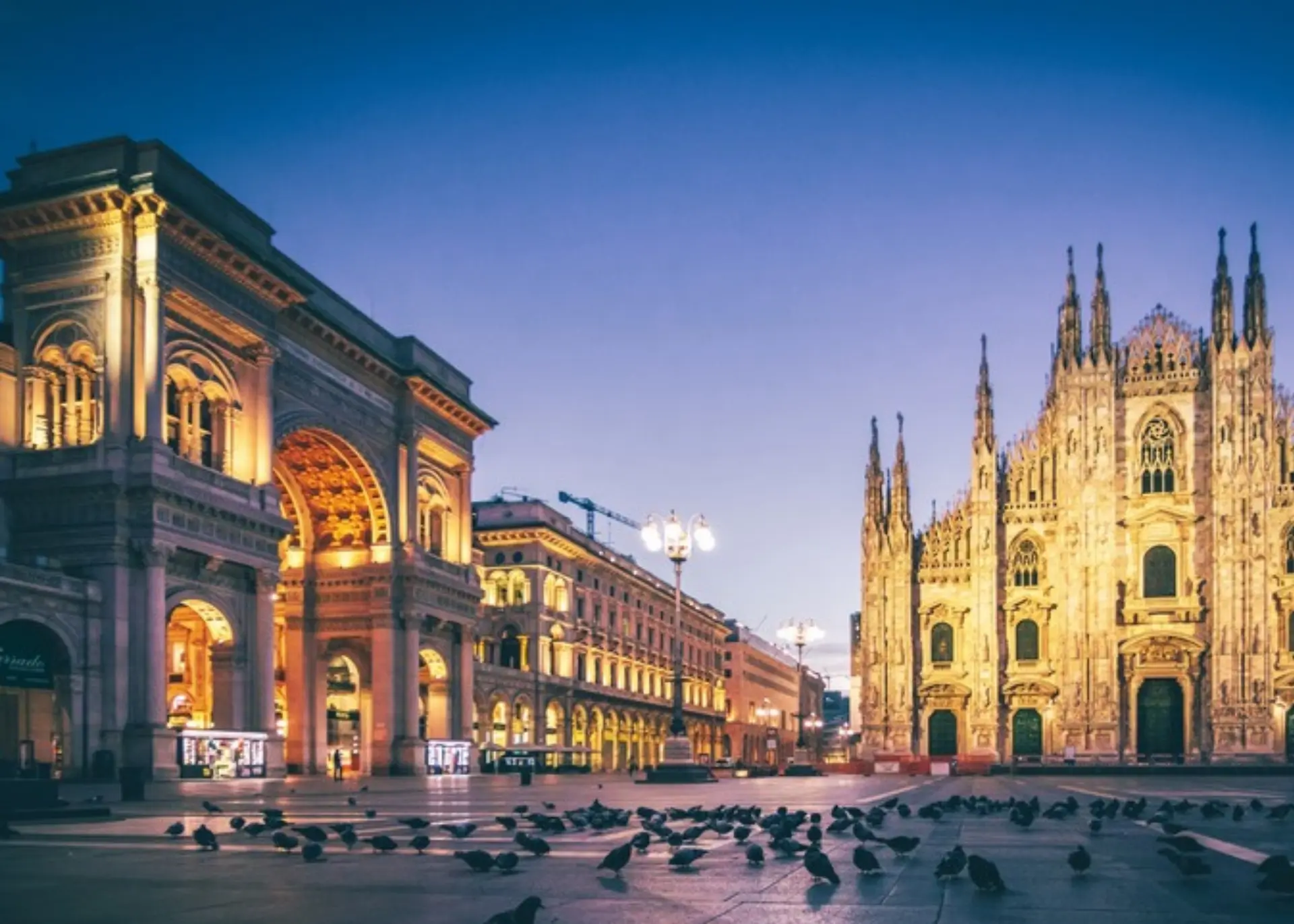 Milan Cathedral and the Galleria Vittorio Emanuele II on Piazza del Duomo at dusk, for Sylvie di Giusto, international keynote speaker in Milan