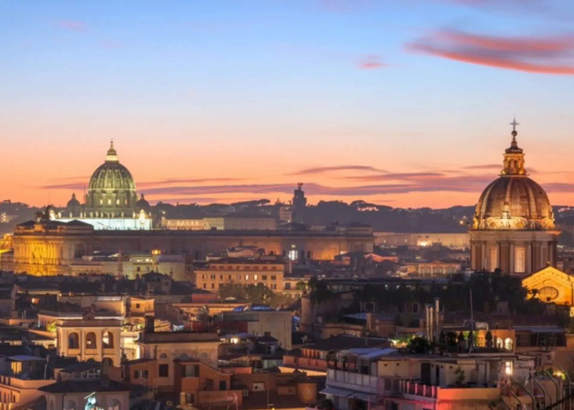 The dome of St. Peter’s Basilica above the rooftops of Rome at dusk, for Sylvie di Giusto, international keynote speaker in Rome