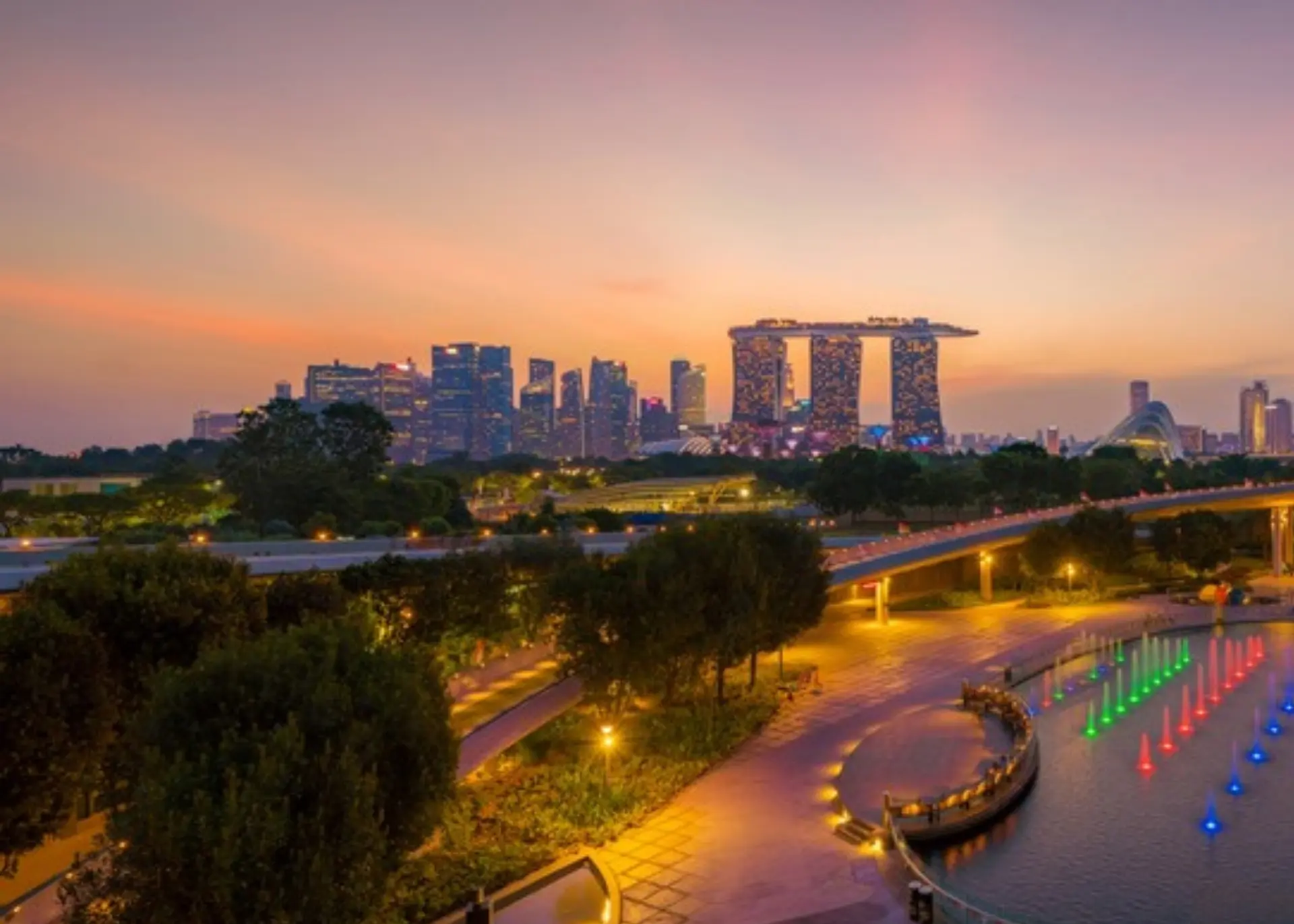Marina Bay Sands and the Singapore skyline seen from Gardens by the Bay at dusk, for Sylvie di Giusto, international keynote speaker in Singapore