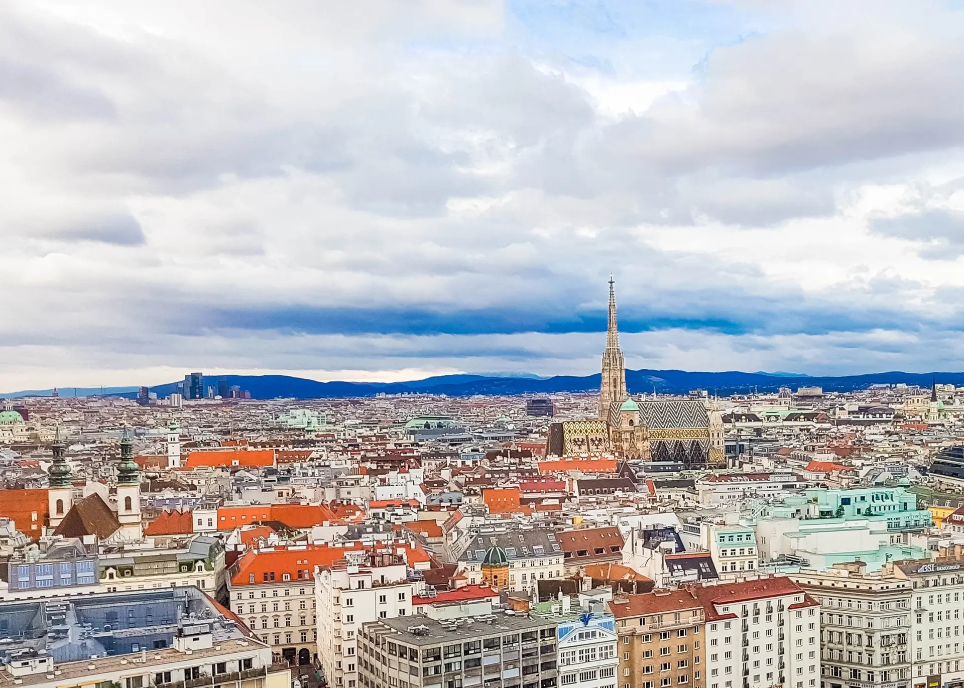 St. Stephen’s Cathedral with its tall Gothic spire and patterned tile roof in the heart of Vienna, for Sylvie di Giusto, international keynote speaker in Vienna