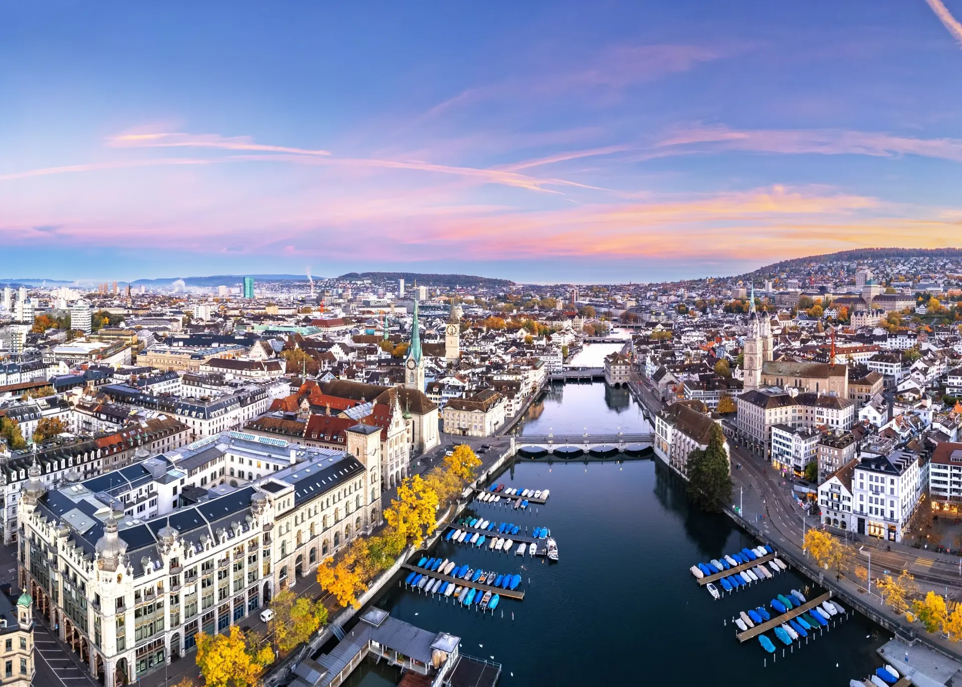 The twin towers of the Grossmünster rising above the Limmat in Zurich’s Old Town, for Sylvie di Giusto, international keynote speaker in Zurich